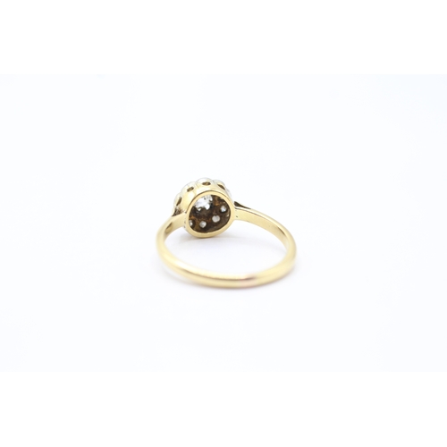 148 - 18ct gold diamond halo ring (3.6g) Size P 1/2