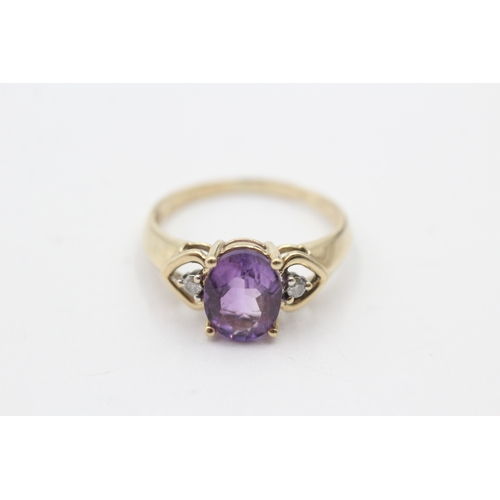 150 - 9ct gold oval purple gemstone and diamond ring (2.3g) Size O