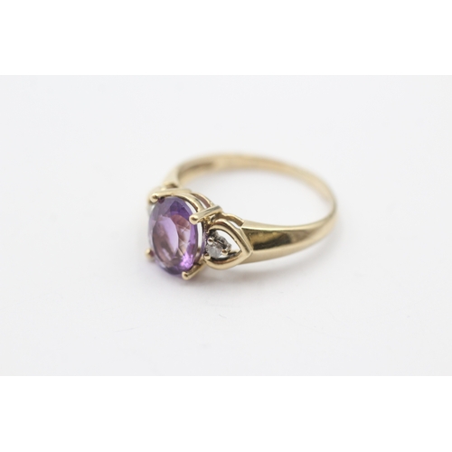 150 - 9ct gold oval purple gemstone and diamond ring (2.3g) Size O