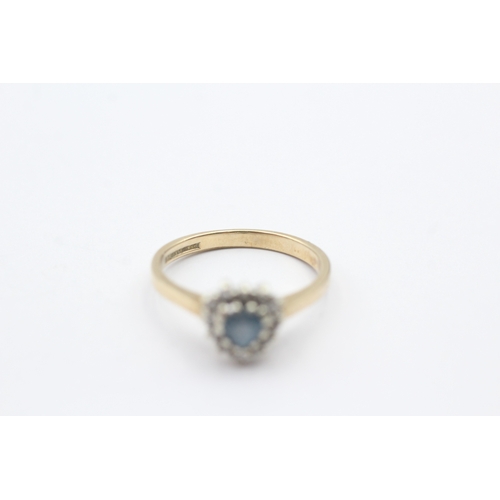 151 - 9ct gold light blue heart shaped gemstone and diamond ring (2.3g) Size M