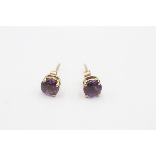 154 - 9ct gold amethyst stud earrings (0.8g)