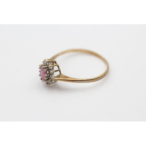 156 - 9ct gold pink gemstone and diamond halo set ring (1.3g) Size O