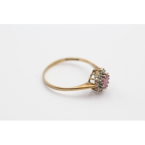 156 - 9ct gold pink gemstone and diamond halo set ring (1.3g) Size O