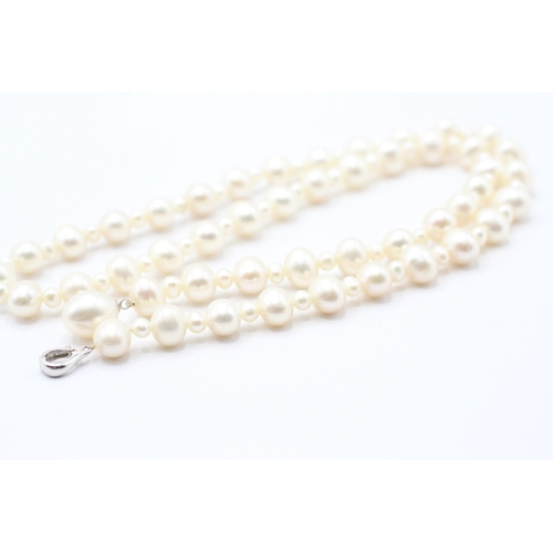 157 - 14ct white gold cultured pearl necklace (42g) - as seen