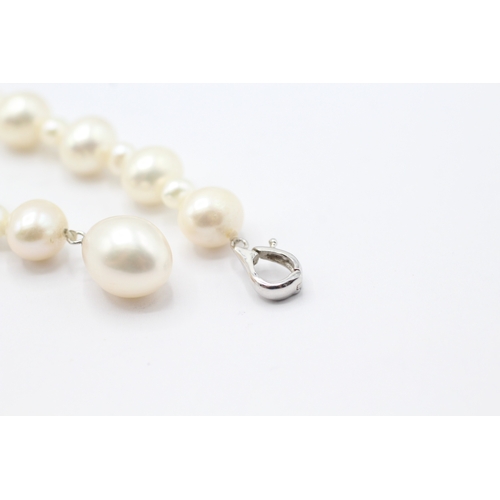 157 - 14ct white gold cultured pearl necklace (42g) - as seen