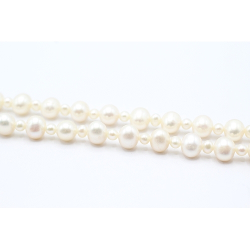 157 - 14ct white gold cultured pearl necklace (42g) - as seen