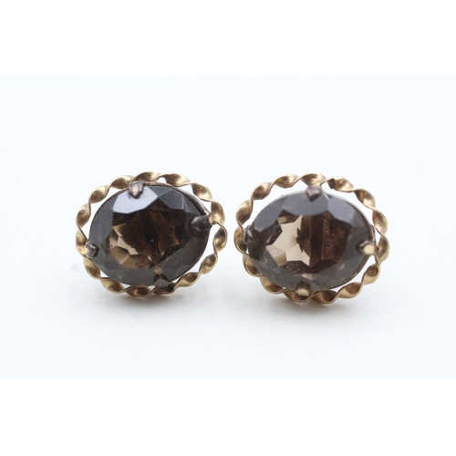 158 - 9ct gold smoky quartz stud earrings (3.6g)