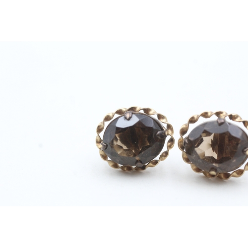 158 - 9ct gold smoky quartz stud earrings (3.6g)