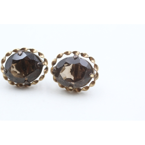 158 - 9ct gold smoky quartz stud earrings (3.6g)