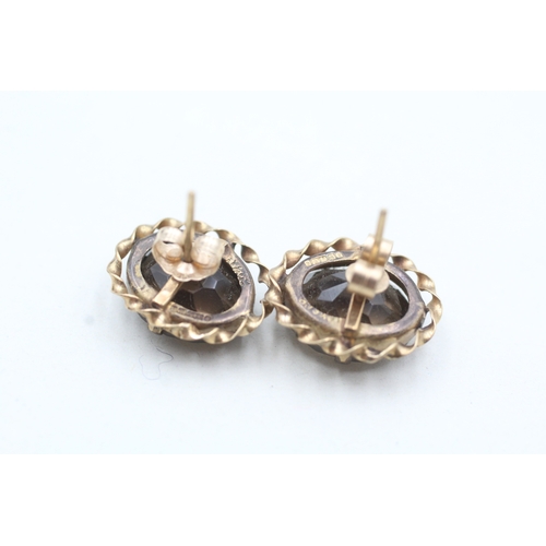 158 - 9ct gold smoky quartz stud earrings (3.6g)