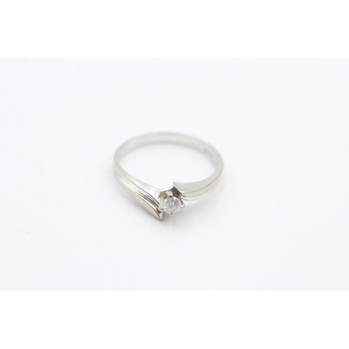 159 - 9ct gold solitaire diamond ring (1.6g) Size K