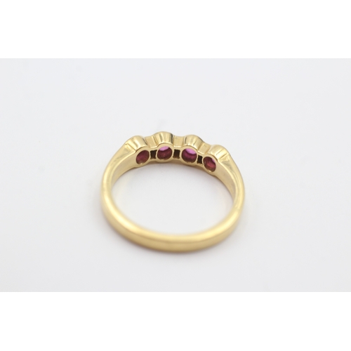 162 - 18ct gold ruby and diamond row set ring (3.8g) Size M