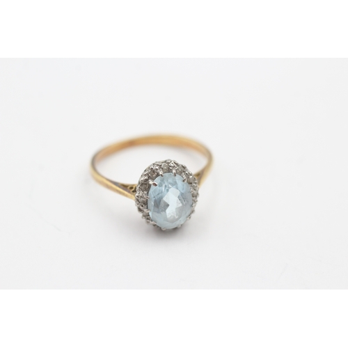 172 - 18ct gold diamond and blue gemstone ring (2.4g) Size K