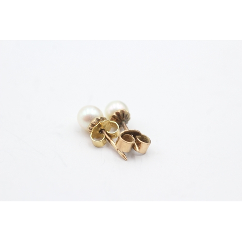 174 - 14ct gold cultured pearl stud earrings (2.3g)