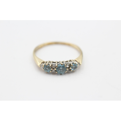 177 - 9ct gold light blue gemstone and diamond ring (1.6g) Size O