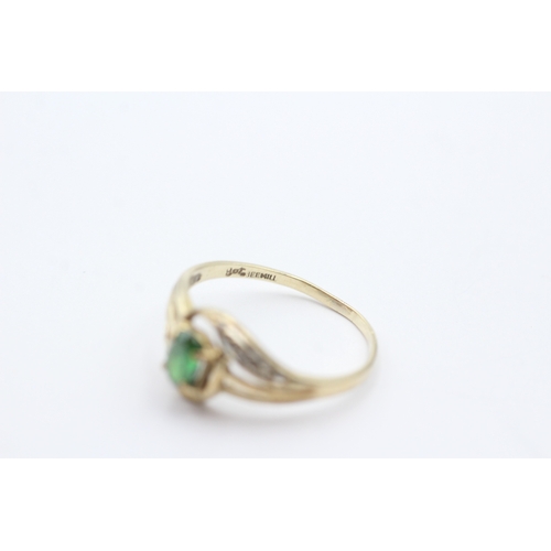 180 - 9ct gold green gemstone and diamond ring (1.6g) Size P