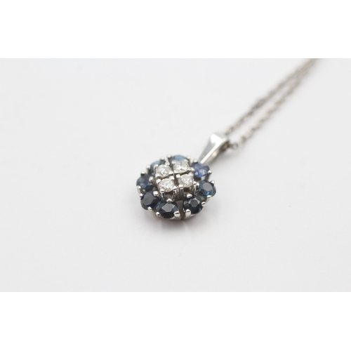 190 - 18ct gold diamond and sapphire pendant on a platinum chain (5.3g)