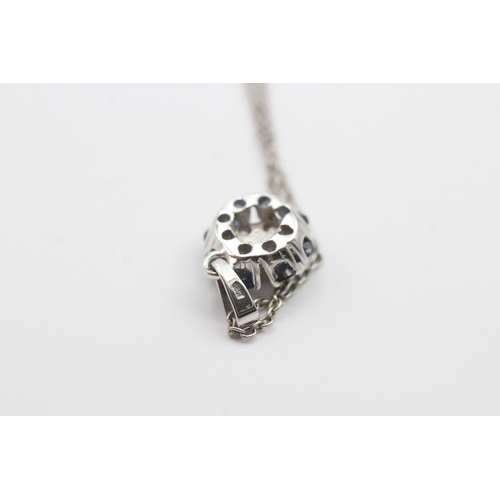 190 - 18ct gold diamond and sapphire pendant on a platinum chain (5.3g)