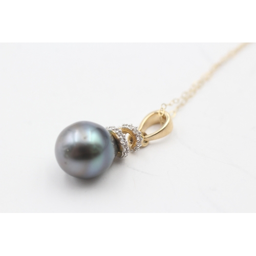 193 - 9ct gold cultured pearl and diamond pendant on chain (3.7g)