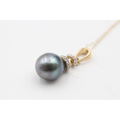 193 - 9ct gold cultured pearl and diamond pendant on chain (3.7g)