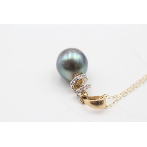 193 - 9ct gold cultured pearl and diamond pendant on chain (3.7g)