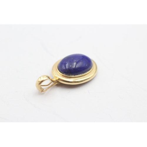 198 - 14ct gold lapis lazuli pendant (2.6g)