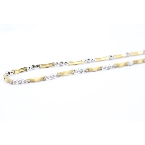 2 - 18ct bi colour gold diamond set necklace (33g)