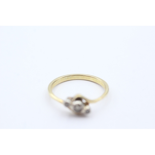 202 - 18ct gold three stone diamond ring (2.5g) Size N 1/2