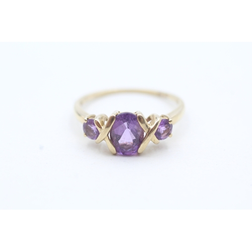 204 - 9ct gold oval and round cut purple gemstone ring (2.1g) Size Q