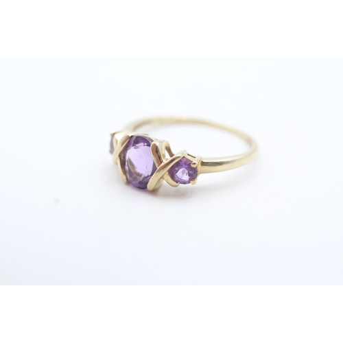 204 - 9ct gold oval and round cut purple gemstone ring (2.1g) Size Q