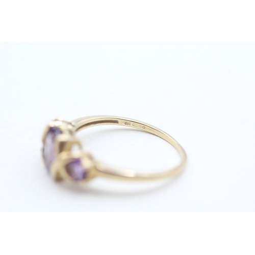 204 - 9ct gold oval and round cut purple gemstone ring (2.1g) Size Q