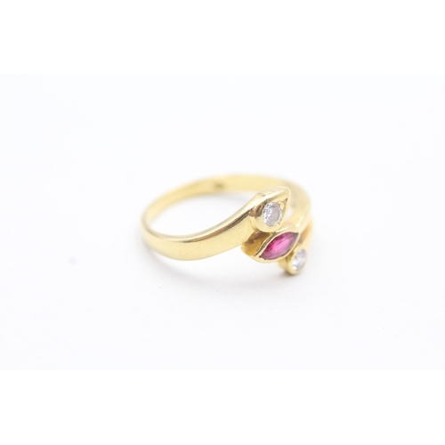 21 - 18ct gold diamond and ruby set bypass ring (3.9g) Size O 1/2