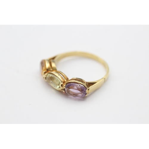 212 - 18ct gold amethyst, citrine and chrysoberyl set trilogy ring (2.9g) Size L