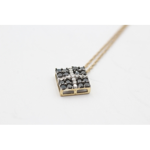 220 - 9ct gold square diamond pendant on chain (2g)