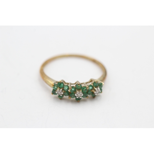 222 - 9ct gold emerald and diamond flower set ring (1.6g) Size R