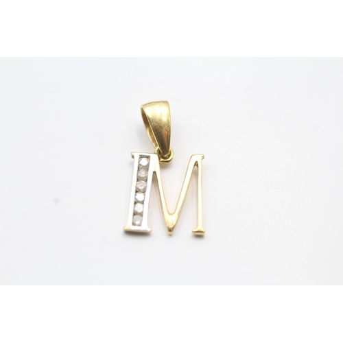 223 - 18ct gold diamond 'M' initial pendant (1.3g)