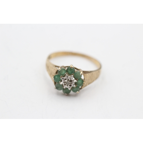 231 - 9ct gold diamond and emerald ring (1.8g) Size N