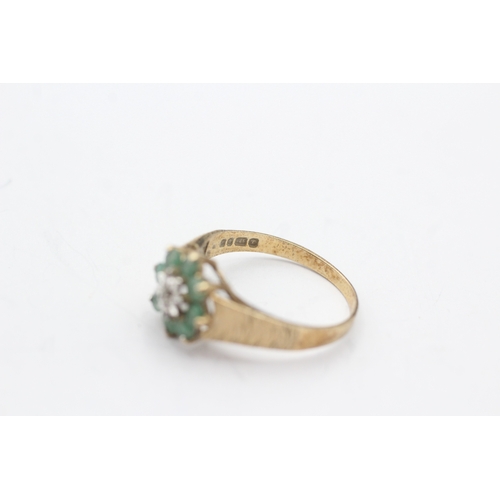 231 - 9ct gold diamond and emerald ring (1.8g) Size N