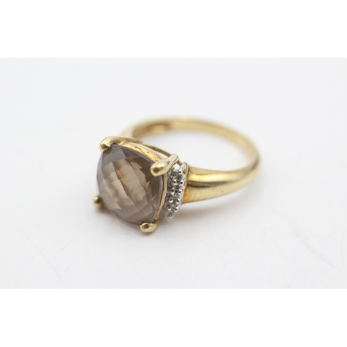 232 - 9ct gold smoky quartz and diamond ring (3.4g) Size M