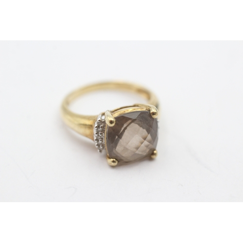 232 - 9ct gold smoky quartz and diamond ring (3.4g) Size M