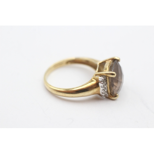 232 - 9ct gold smoky quartz and diamond ring (3.4g) Size M