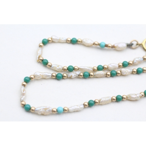 243 - 9ct gold rice pearl and blue gemstone beaded necklace (3.2g)