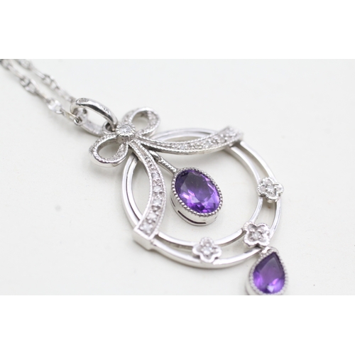 249 - 9ct white gold diamond & amethyst pendant necklace (4.2g)