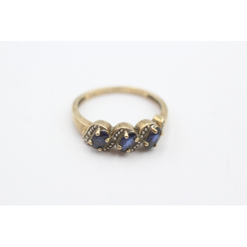 48 - 9ct gold sapphire and diamond three stone ring (2g) Size N