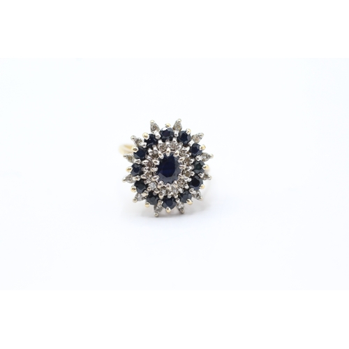 58 - 18ct gold sapphire and diamond cluster set cocktail ring (7.2g) Size O