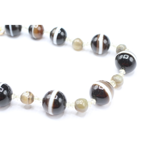 6 - 15ct gold clasped bullseye agate necklace (100.6g)