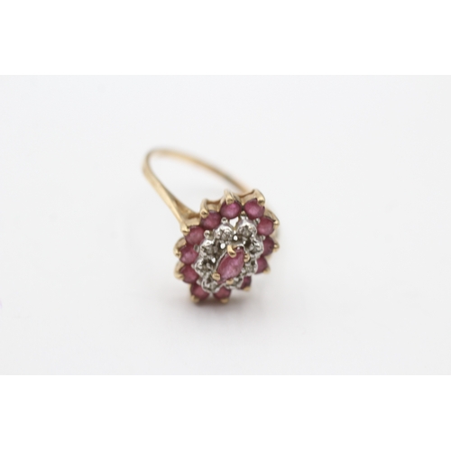 70 - 9ct gold ruby and diamond double halo ring (2.1g) Size O 1/2