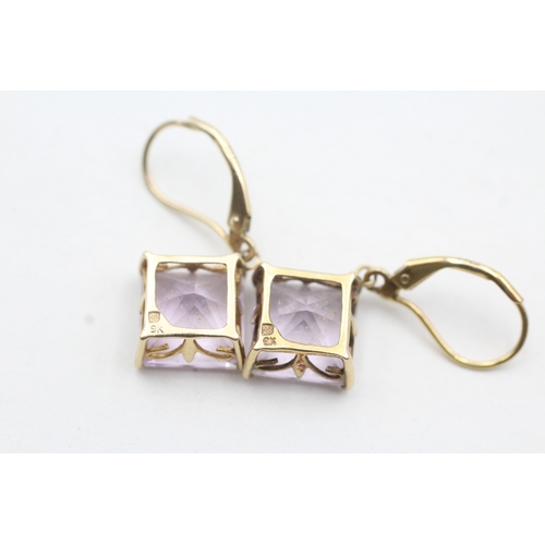 73 - 9ct gold purple gemstone drop earrings (3.8g)