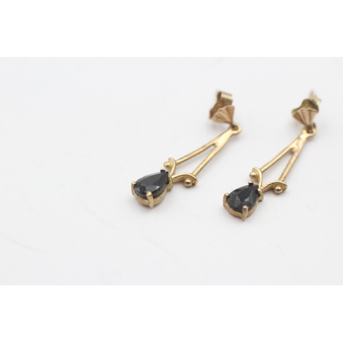 77 - 9ct gold and sapphire drop stud earrings (1.2g)