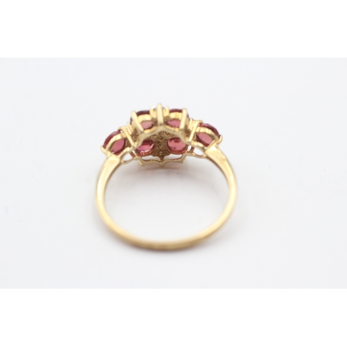 84 - 9ct gold red gemstone and diamond cluster ring (2.1g) Size N 1/2